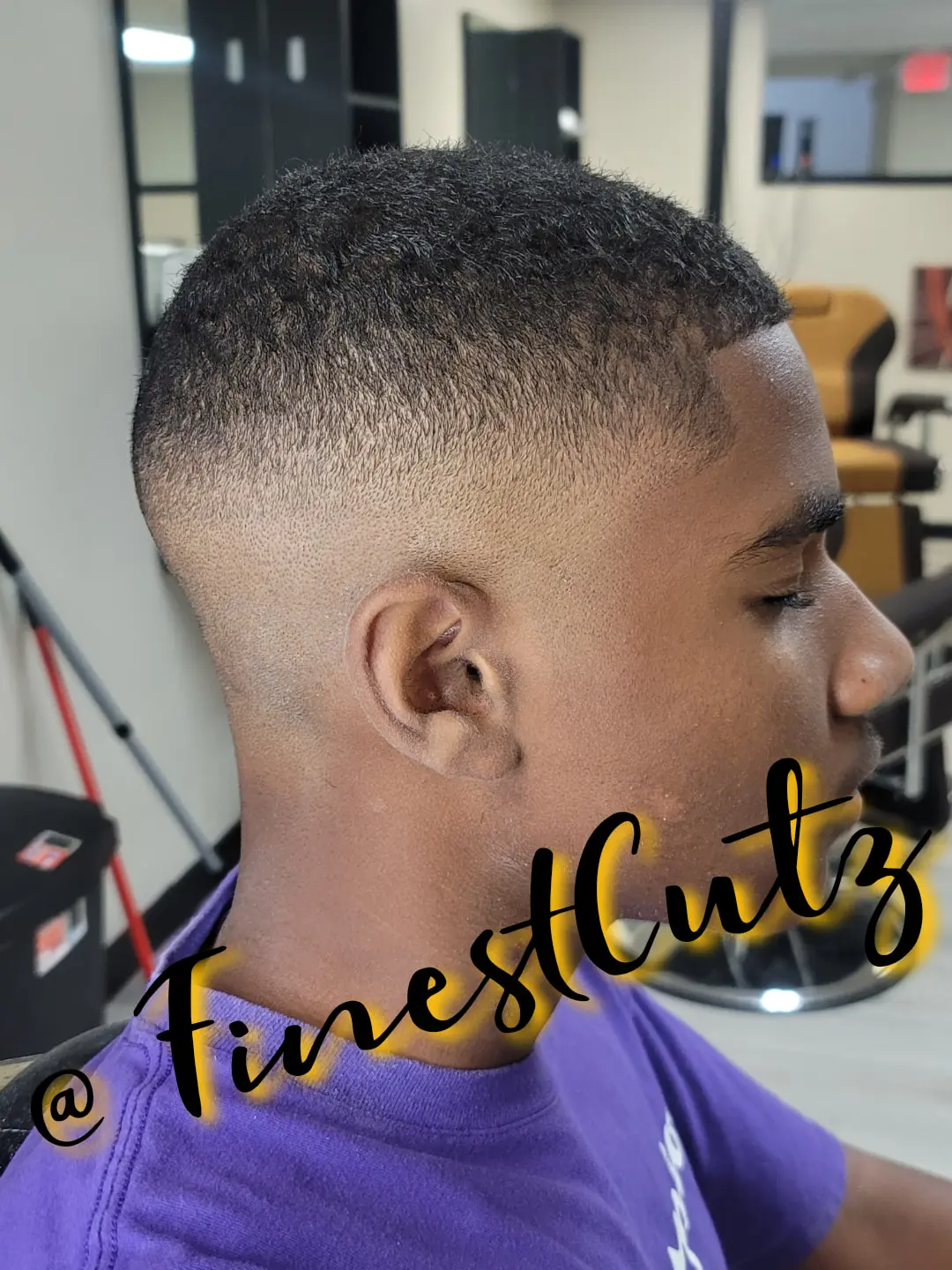 Side profile of a sharp skin fade