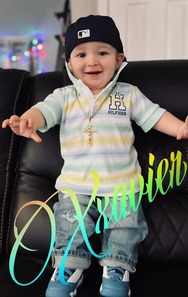 The shop’s youngest client in the barber chair